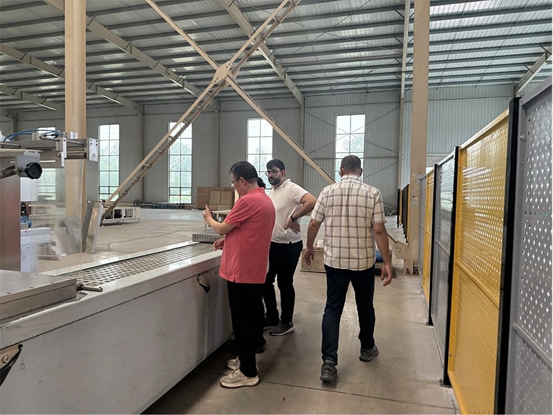 An overseas client from Morocco visited our company for an on-site inspection of our food vacuum packaging equipment.