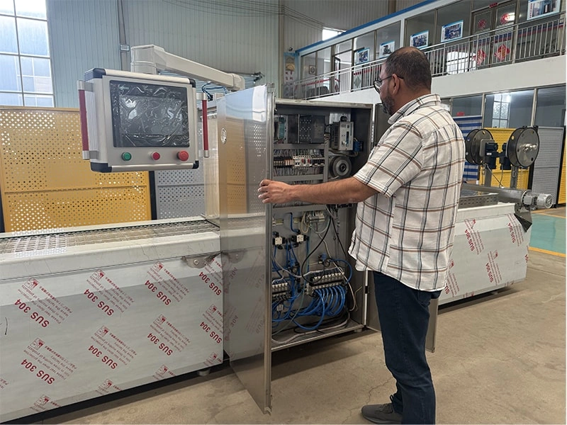 An overseas client from Morocco visited our company for an on-site inspection of our food vacuum packaging equipment.